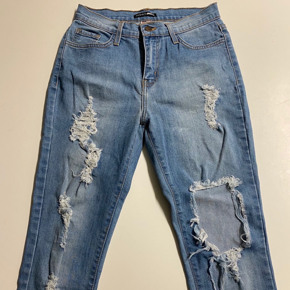 Brand NEW high waisted ripped jeans
